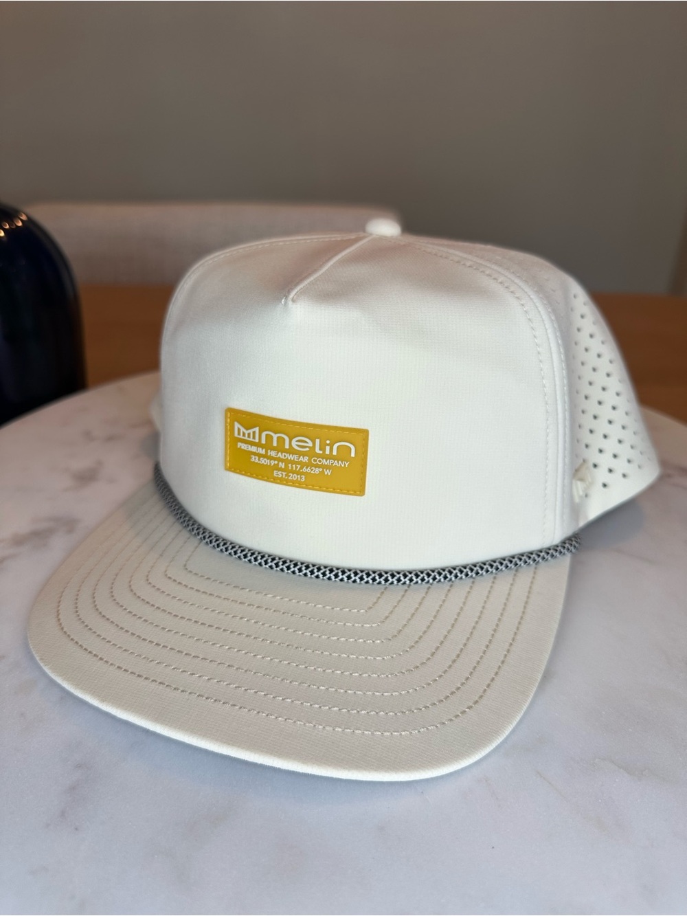 Melin Men's White Trucker Snapback Hat with Yellow Logo Patch NEW